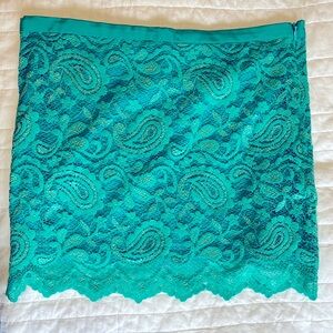 Gilber Gilmore turquoise lace mini skirt